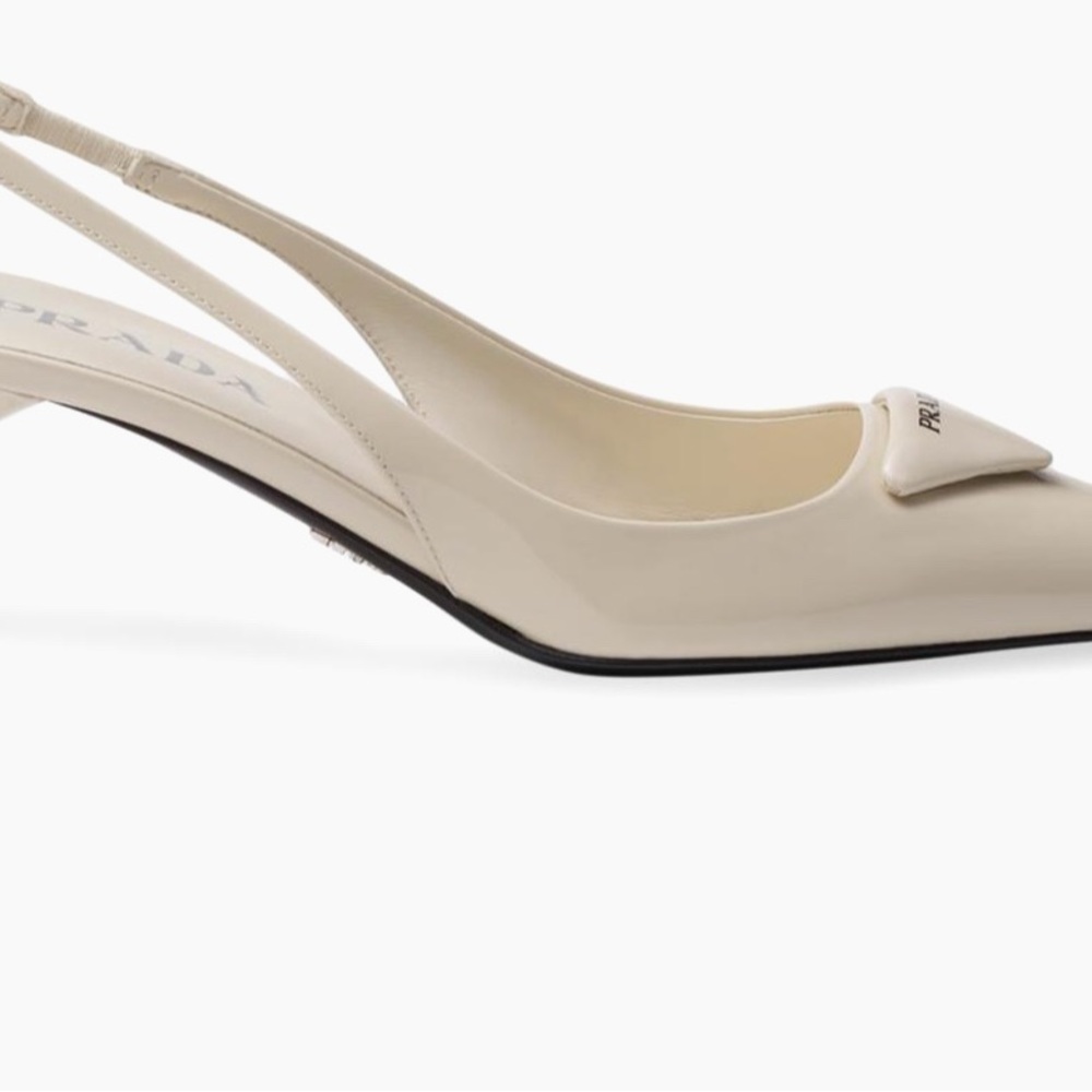 Prada Women's Beige Slingback Heels
Patent leather 55Mm sling back pumps. - Picture 3 of 4